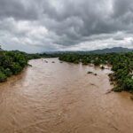 Vista panorámica del río Yaque del Norte con aguas turbias
